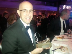 Ian Lipton, President and Chief Operating Officer of The Carbon Accounting Company, holds the 2013 Project ICARUS Outstanding Achievement Award at the GBTA Foundation Gala Dinner this week.  The Award was presented in recognition of the company’s Green Hotels Global program.
